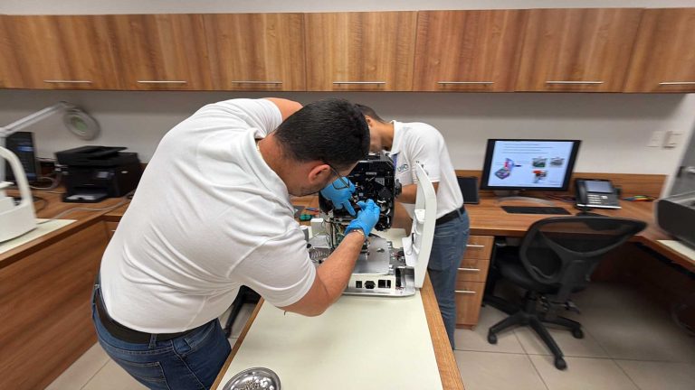 Technician servicing an instrument in the service lab